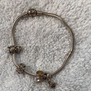Pandora bracelet with 4 charms